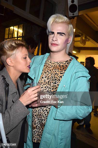 Socialite Romain Yurkievich and a guest attend the Michel Gondry Exhibition Preview at La Blanchisserie Restaurant Gallery on April 7, 2012 in Paris,...