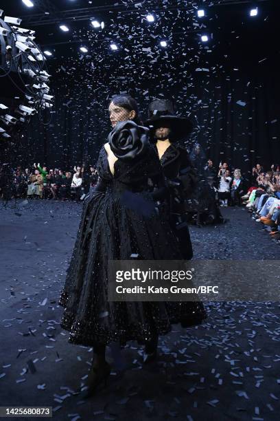 Models walk the runway at the finale of the Richard Quinn show during London Fashion Week September 2022 on September 20, 2022 in London, England.