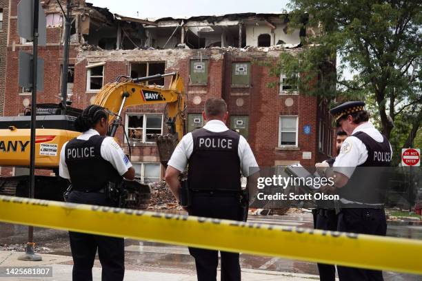 Police secure the area around an apartment building that was heavily damaged by an explosion on September 20, 2022 in Chicago, Illinois. The cause of...