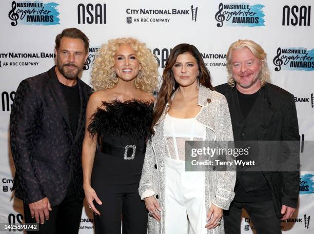 Jimi Westbrook, Kimberly Schlapman, Karen Fairchild, and Phillip Sweet of Little Big Town attend NSAI 2022 Nashville Songwriter Awards at Ryman...