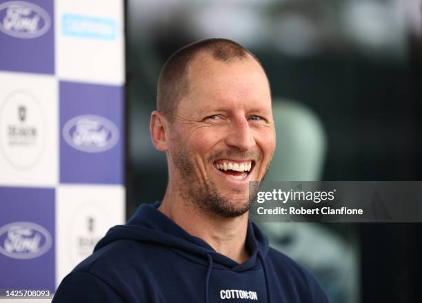 Cats assistant coach James Kelly speaks to the media during a Geelong Cats AFL training session at GMHBA Stadium on September 21, 2022 in Geelong,...