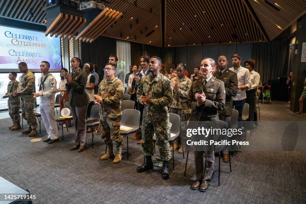 Military personnel during special naturalization ceremony at New York Public Library Stavros Niarchos Foundation Library.