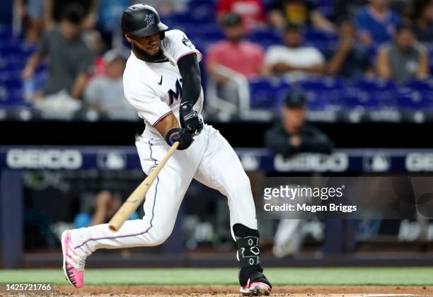 Bryan De La Cruz of the Miami Marlins singles against the Chicago Cubs in the second inning at loanDepot park on September 20, 2022 in Miami, Florida.