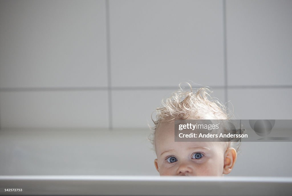 Young baby girl in bathtub
