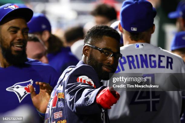 Jackie Bradley Jr. #25 of the Toronto Blue Jays reacts after hitting a three run home run during the ninth inning against the Philadelphia Phillies...