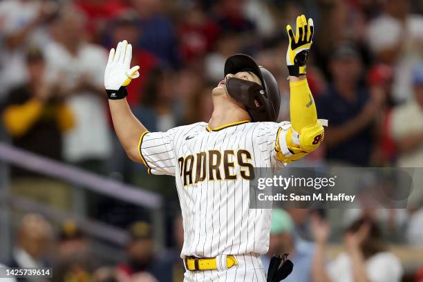 Ha-Seong Kim of the San Diego Padres reacts after hitting a solo homerun during the fourth inning of a game against the St. Louis Cardinals at PETCO...