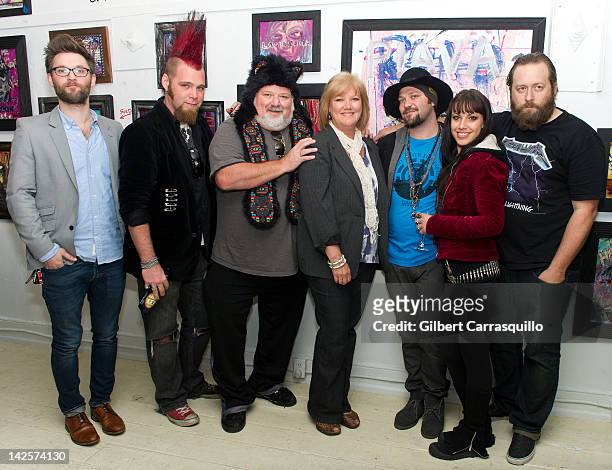Justin Muir, Geoff "Red Mohawk" Blake, Phil Margera, April Margera, Bam Margera, Nicole Boyd and Ryan Gee attend the Bam Margera & Friends art...