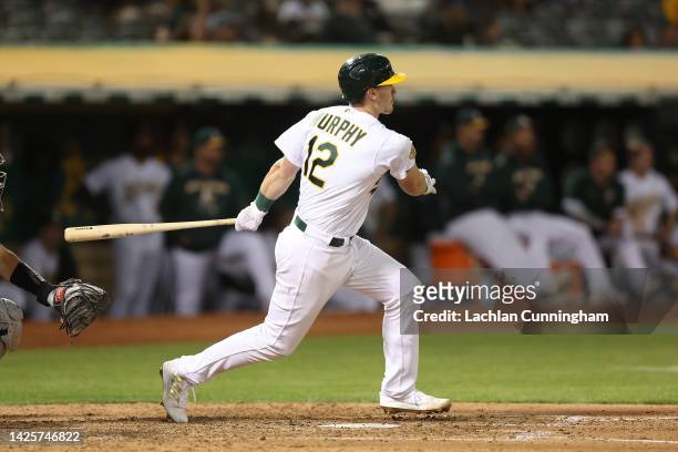 Sean Murphy of the Oakland Athletics hits an RBI double in the bottom of the fifth inning at RingCentral Coliseum on September 20, 2022 in Oakland,...