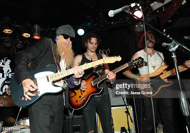 Musicians Billy Gibbons, Jesse Kotansky and Joseph Grazi of the band The Click Clack Boom perform during the Andrew Charles Presents 'The Click Clack...