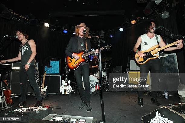 Musicians Jesse Kotansky, Nathaniel Hoho and Jospeph Grazi of the band The Click Clack Boom perform during the Andrew Charles Presents 'The Click...