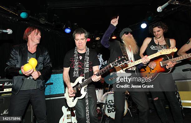 Singer Donovan Leitch, Andy Hilfiger, musicians Billy Gibbons, and Jesse Kotansky of the band The Click Clack Boom perform during the Andrew Charles...