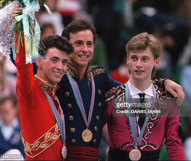 Figure skater Brian Boitano , Canadian Brian Orser and Ukrainian Viktor Petrenko smile on the podium following the men's competition 20 February 1988...