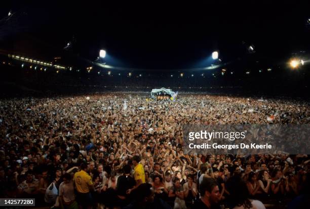 General view of the crowd during the Live Aid concert at Wembley Stadium in London, 13th July 1985. The concert raised funds for famine relief in...