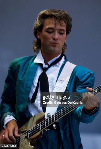 Martin Kemp of Spandau Ballet performs at the Live Aid concert at Wembley Stadium in London, 13th July 1985. The concert raised funds for famine...