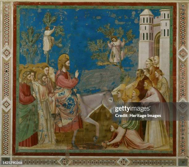 The Entry of Christ into Jerusalem , 1304-1306. Found in the collection of the Cappella degli Scrovegni, Padua. Artist Giotto di Bondone .
