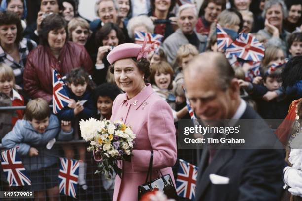 Queen Elizabeth II and Prince Philip meet the public on a walkabout in Kent, 31st October 1984.