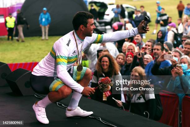 Michael Matthews of Australia takes a picture on the podium ceremony after the 95th UCI Road World Championships 2022 - Team Time Trial Mixed Relay /...