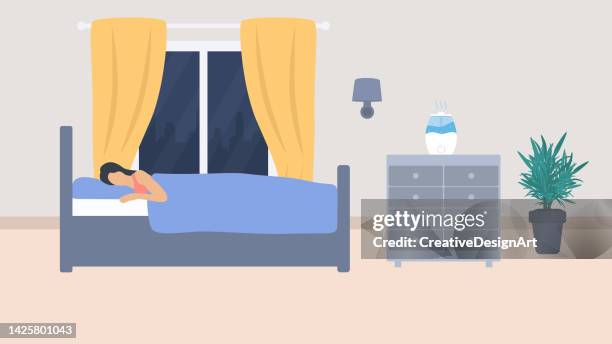junge frau, die mit luftbefeuchter im schlafzimmer schläft - napping stock-grafiken, -clipart, -cartoons und -symbole