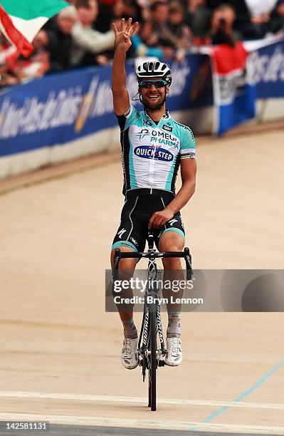 Tom Boonen of Belgium and Quick Step Omega Pharma crosses the finishline to win the 2012 Paris Roubaix cycle race from Compiegne to Roubaix on April...