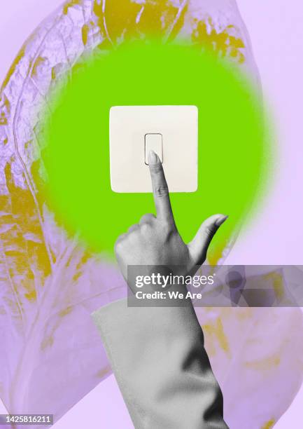 hand pressing light switch - dito umano foto e immagini stock