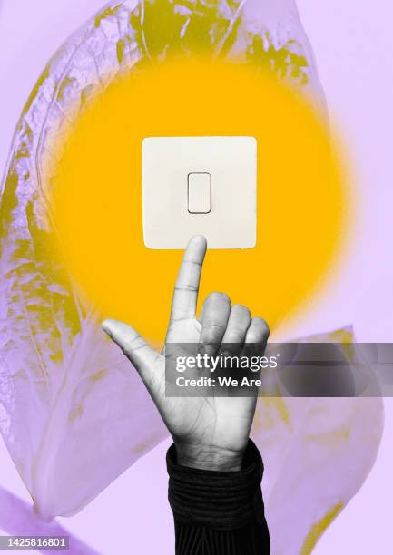 hand pressing light switch - schalter stock-fotos und bilder