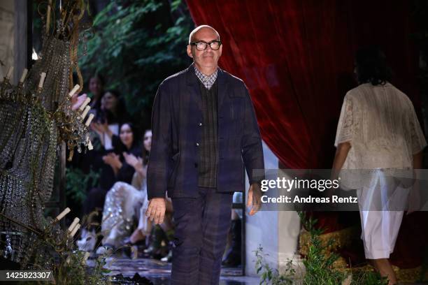 Fashion designer Antonio Marras acknowledges the applause of the audience at the Antonio Marras Fashion Show during the Milan Fashion Week Womenswear...