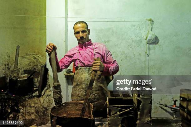 Ramy El Halawani An Egyptian factory worker forms candy dolls in preparation for the upcoming Mawlid celebrations , at a traditional factory in Bab...