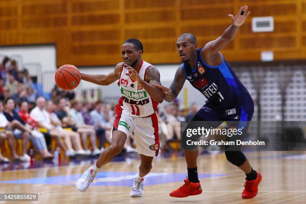 Bryce Cotton of the Wildcats drives at the basket during the NBL Blitz match between Melbourne United and Perth Wildcats at Darwin Basketball...