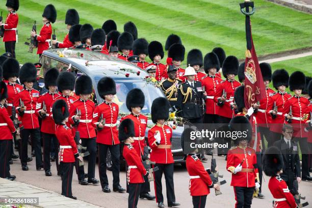 The coffin of Queen Elizabeth II is carried in The state hearse as it proceeds towards St. George's Chapel on September 19, 2022 in Windsor, England....