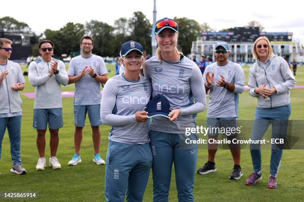 England's Freya Kemp is presented with her debut cap by team mate Danni Wyatt during the 2nd Royal London ODI between England Women and India Women...