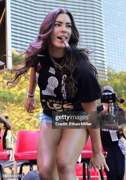 Kelsey Plum of the Las Vegas Aces is introduced during the team's WNBA championship victory parade and rally on the Las Vegas Strip on September 20,...