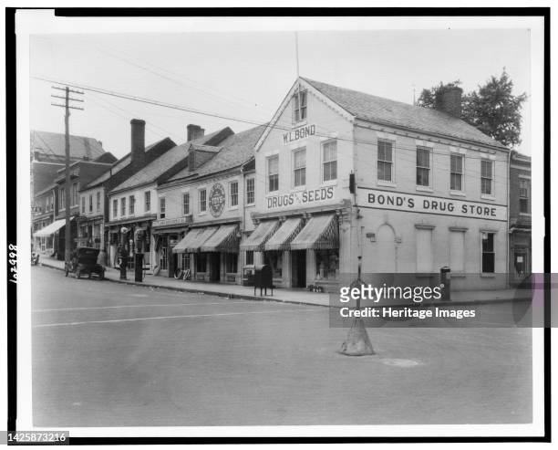 Brick Row, Commerce and Main Streets, located in the vicinity of Fredericksburg or Falmouth Virginia, circa 1925. Artist Frances Benjamin Johnston.