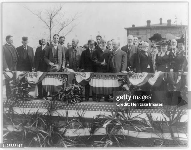 Andrew Carnegie and other dignitaries on the platform at the 25th anniversary of Tuskegee Institute, Alabama, 1906. [Industrialist and philanthropist...