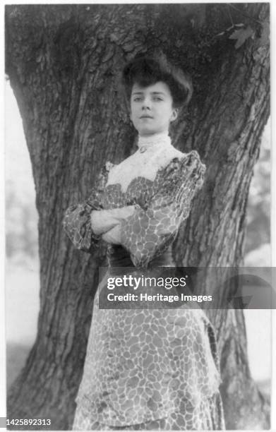 Alice Longworth, 1884-1980, 1902. Three-quarter length portrait, standing, facing left, arms folded. [Daughter of President Theodore Roosevelt and...