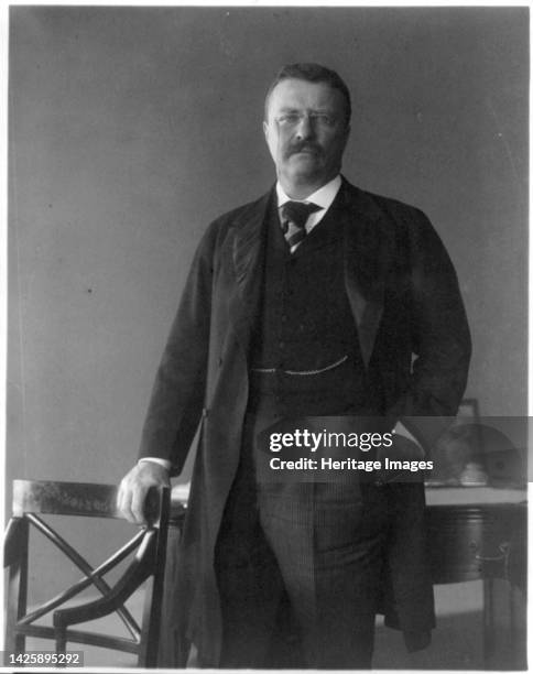 Theodore Roosevelt, Pres. U.S., 1858-1919, 1902. Photograph shows a portrait of Theodore Roosevelt, standing, three-quarter length, facing front....