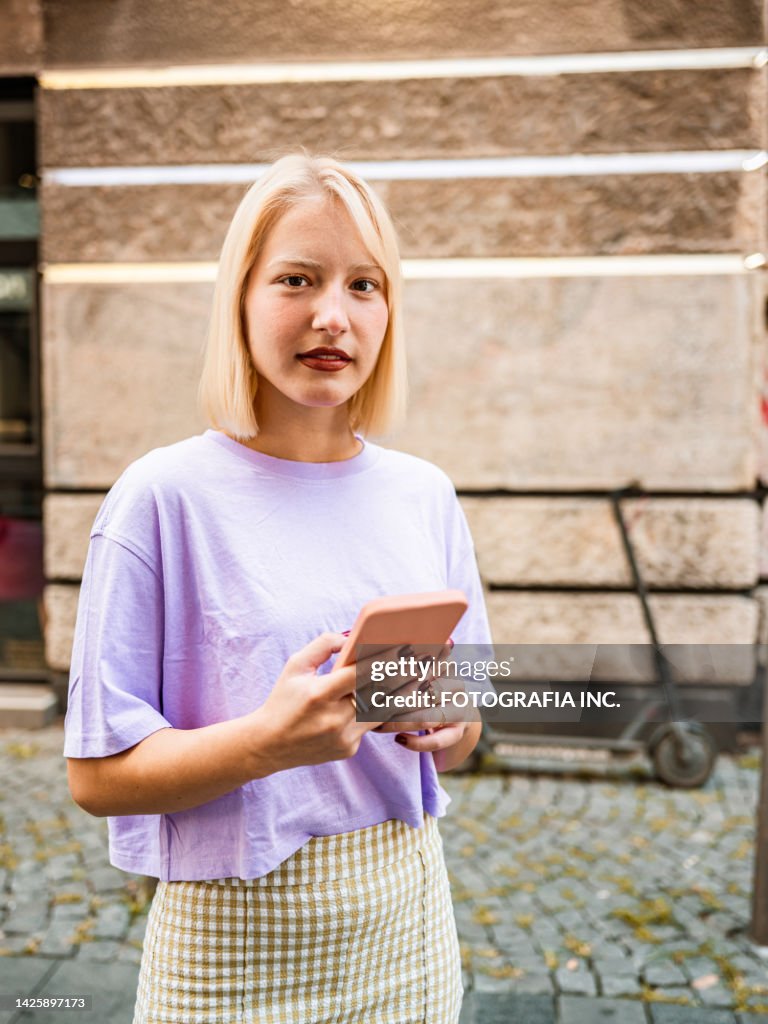 Portrait of Young Caucasian albino woman outdoors