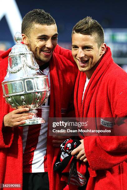 Zakaria Labyad and Dries Mertens of PSV lead celebrations with the trophy after victory in the Dutch Cup Final between PSV Eindhoven and SC Heracles...