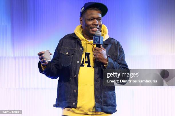 Michael Che speaks onstage during NRDC's "Night of Comedy", Honoring Anna Scott Carter, Presented In Partnership With Warner Bros. Discovery on...