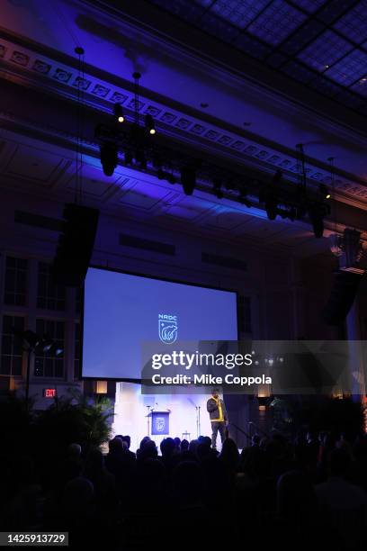 Michael Che speaks onstage during NRDC's "Night of Comedy", Honoring Anna Scott Carter, Presented In Partnership With Warner Bros. Discovery on...