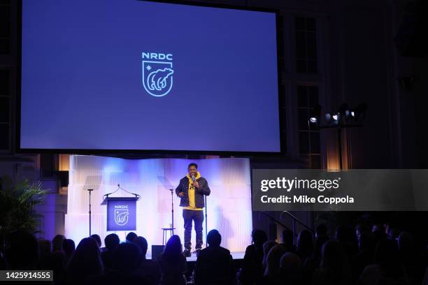 Michael Che speaks onstage during NRDC's "Night of Comedy", Honoring Anna Scott Carter, Presented In Partnership With Warner Bros. Discovery on...