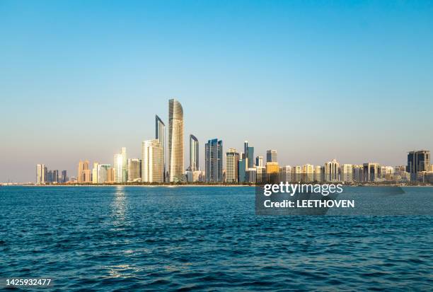 abu dhabi city skyline - abu dhabi skyline stock pictures, royalty-free photos & images