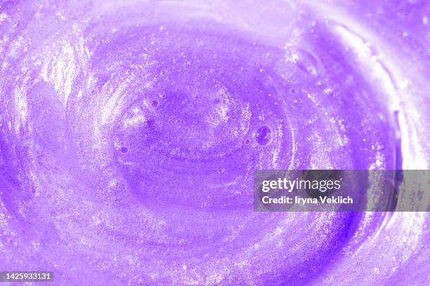 gloss texture in trendy color of the year 2022 very peri purple violet. beauty product smear. - hair treatment stock-fotos und bilder