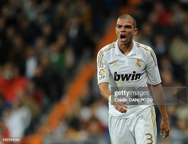 Real Madrid's Portuguese defender Pepe reacts during the Spanish league football match Real Madrid vs Valencia at Santiago Bernabeu stadium on April...