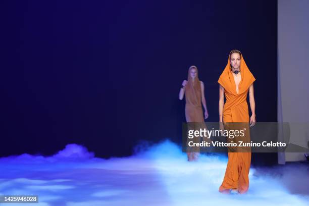 Models walk the runway of the Alberta Ferretti Fashion Show during the Milan Fashion Week Womenswear Spring/Summer 2023 on September 21, 2022 in...