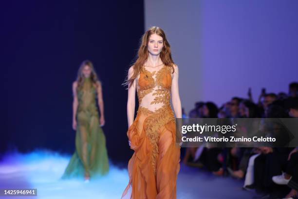 Model walks the runway of the Alberta Ferretti Fashion Show during the Milan Fashion Week Womenswear Spring/Summer 2023 on September 21, 2022 in...