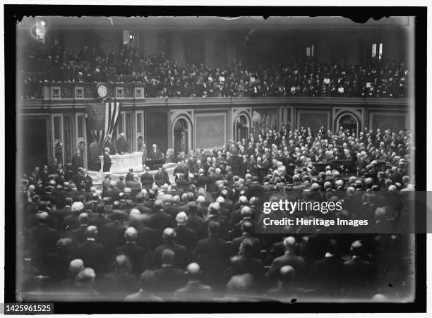 Woodrow Wilson before Congress, between 1913 and 1918. President of the United States. Women permitted to watch from the public gallery. In November...