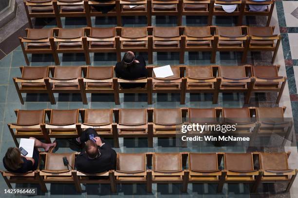 People attend a memorial service for the late Queen Elizabeth II at the National Cathedral on September 21, 2022 in Washington, DC. The Washington...