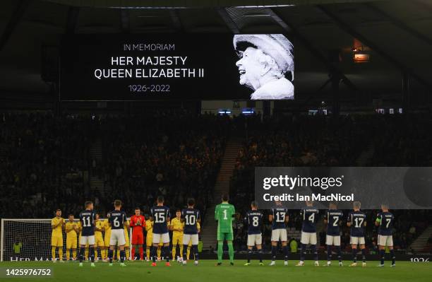 General view as an LED board inside the stadium displays a tribute to Her Majesty Queen Elizabeth II, who passed away at Balmoral Castle on September...