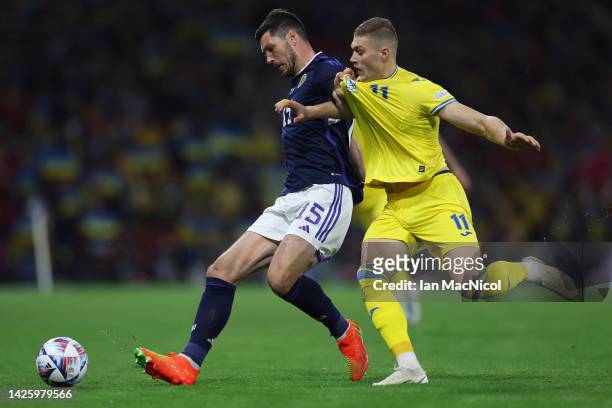 Scott McKenna of Scotland and Artem Dovbyk of Ukraine battle for the ball during the UEFA Nations League League B Group 1 match between Scotland and...
