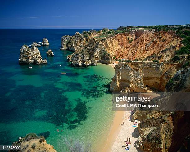 praia do camilo, lagos, algarve, portugal - lagos portugal stockfoto's en -beelden